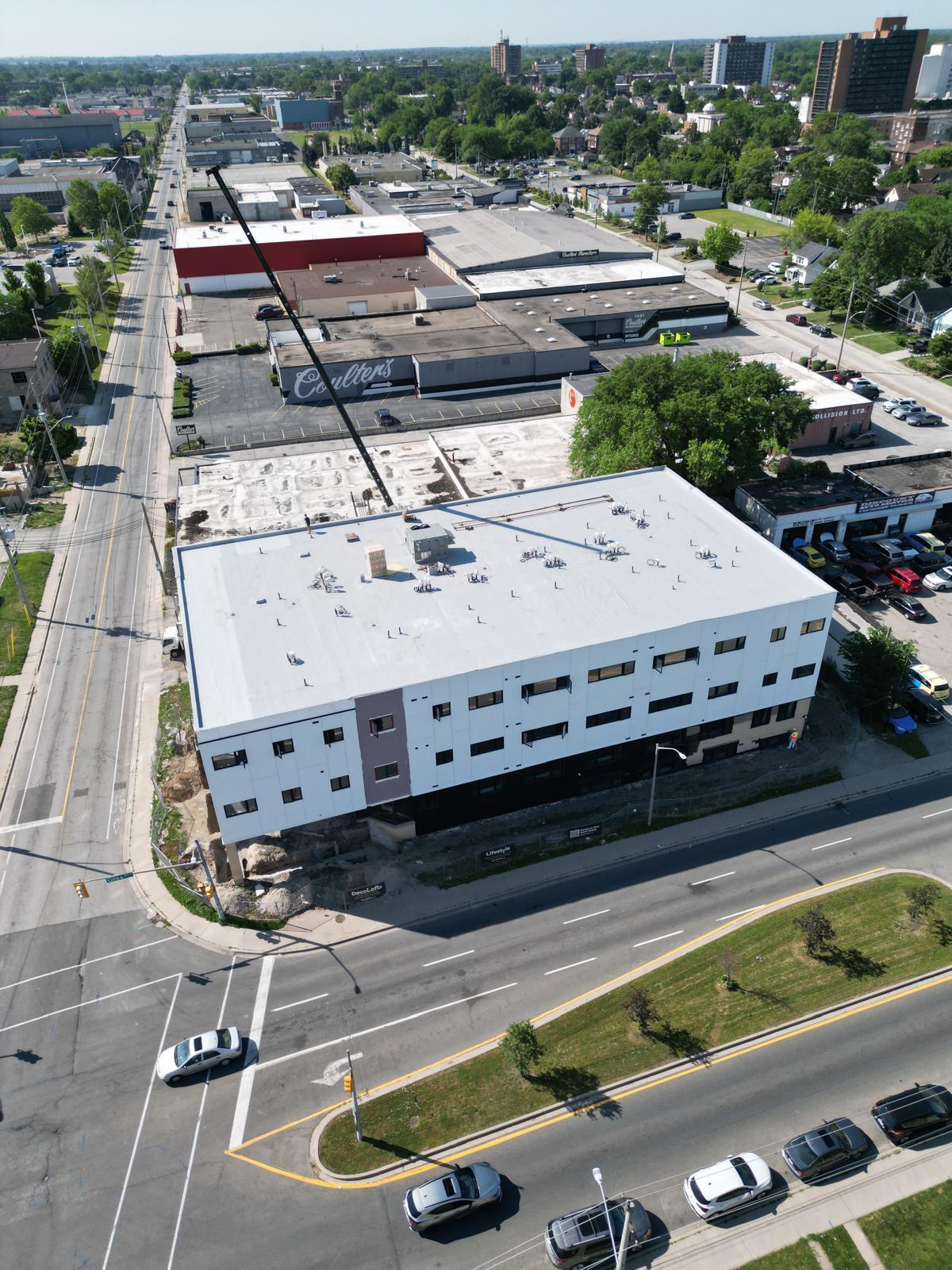 Aerial view of the Deco Lofts building and surrounding streets in Windsor